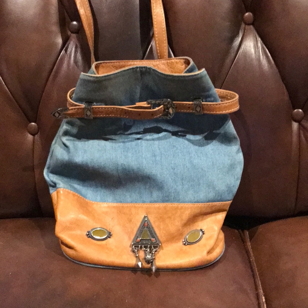 Woman’s blue jean with leather and stones